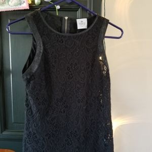 Sexy, lacey, zip back top, leather trim, perfect for the holidays!